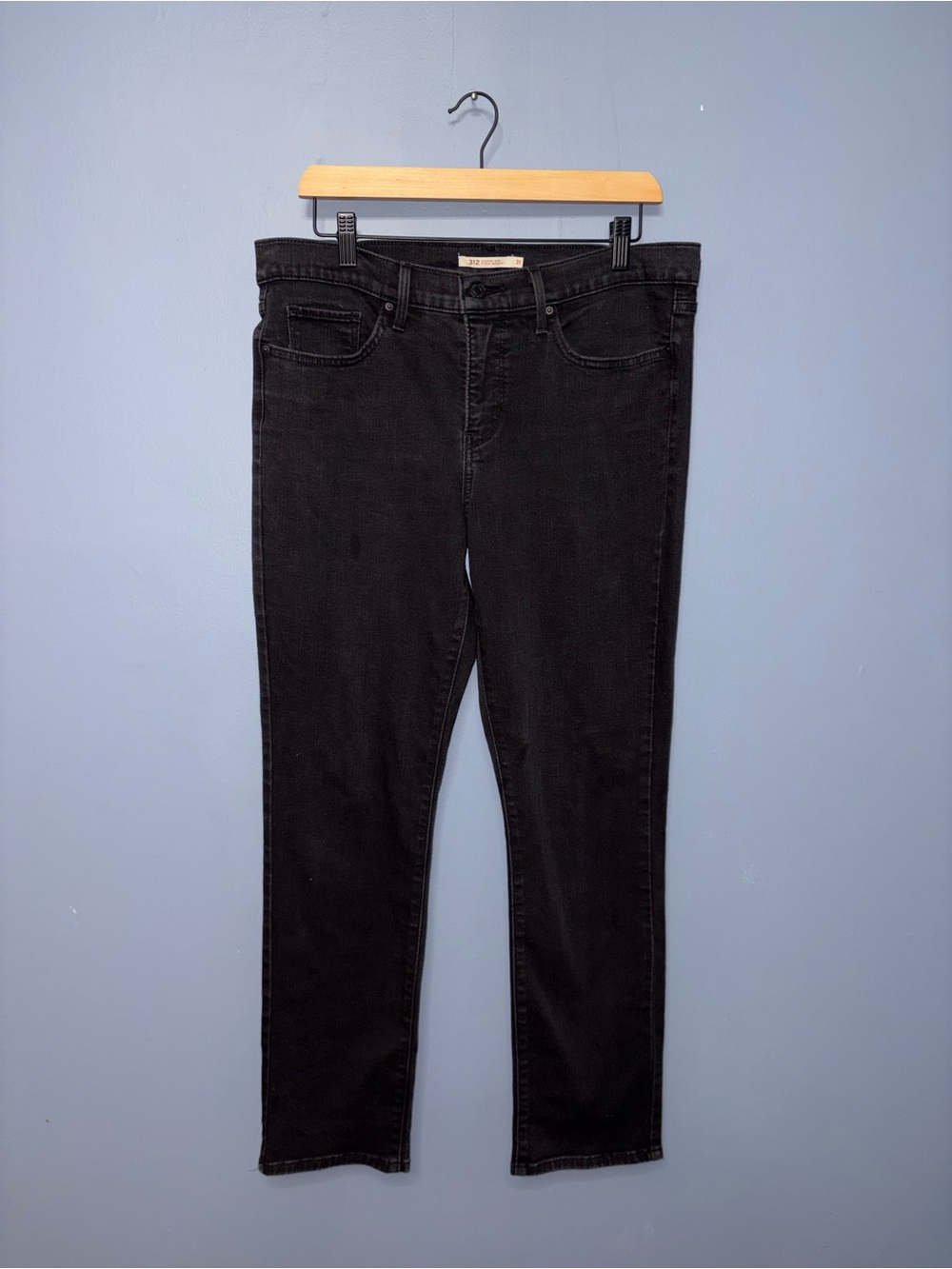 Levi’s • Black 312 Slim Jeans